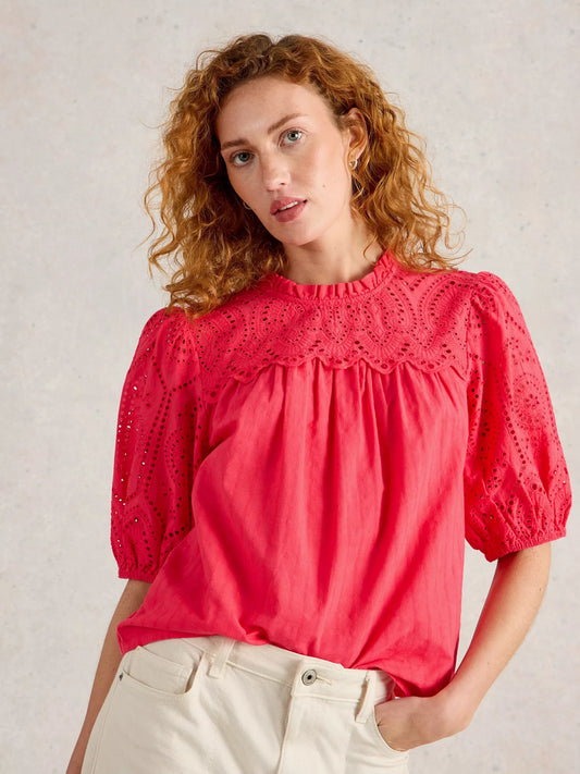 the Lexi Cotton Broderie Top! Featuring delicate broderie lace detailing and a bright coral pink colou