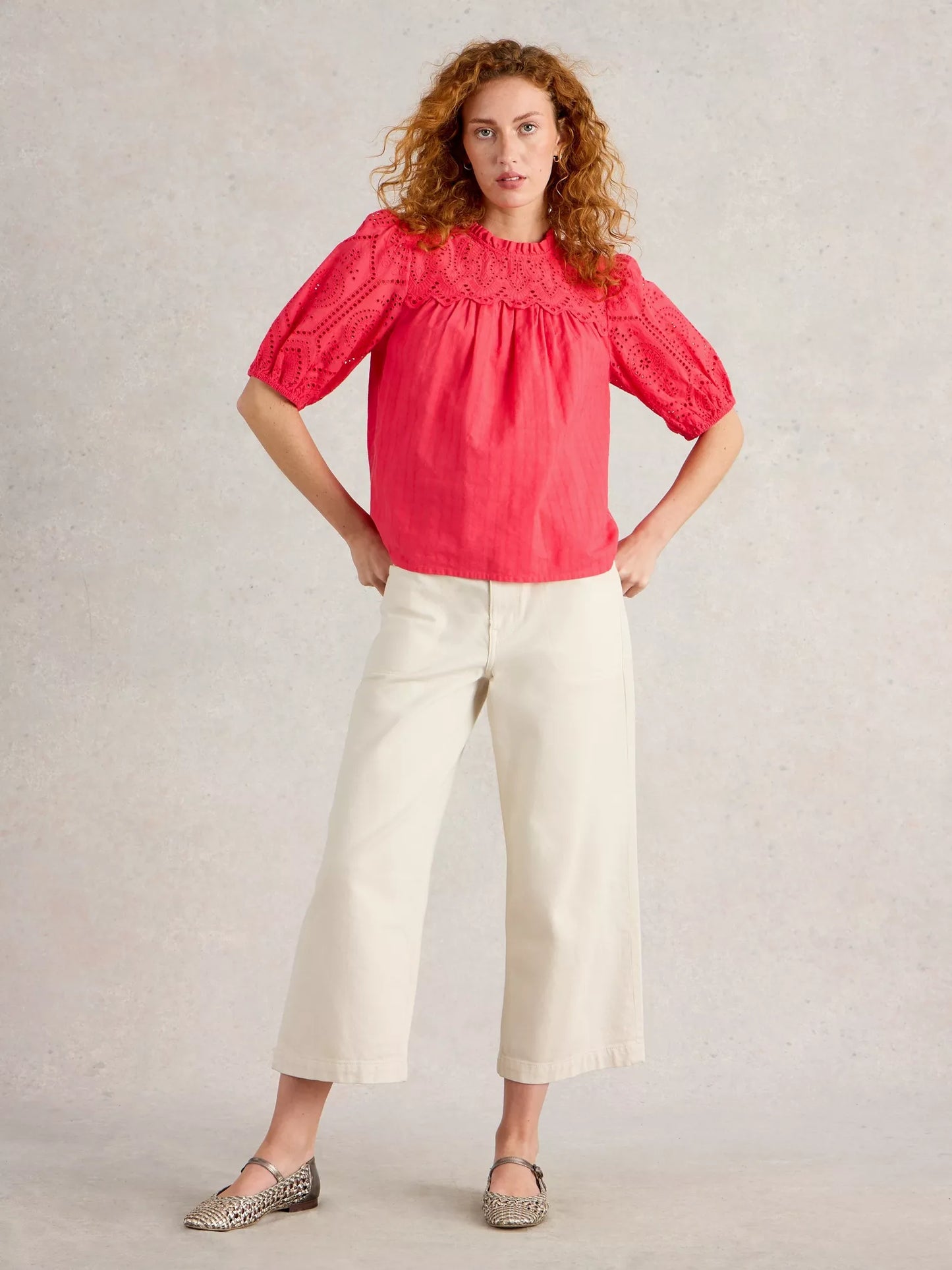 the Lexi Cotton Broderie Top! Featuring delicate broderie lace detailing and a bright coral pink colou