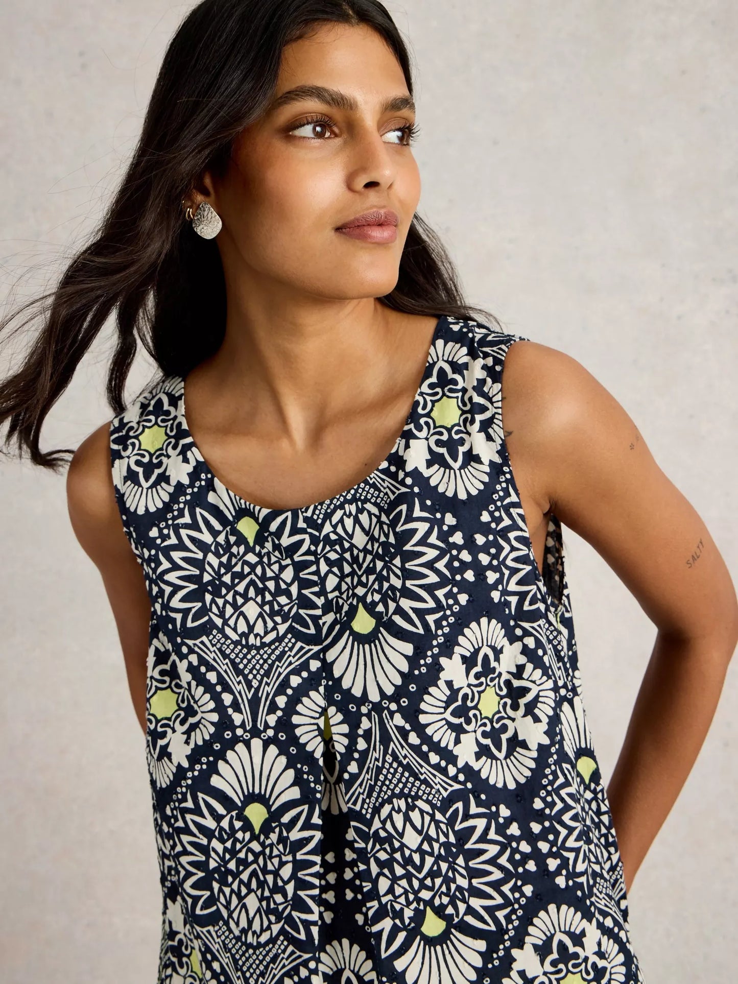 Paradise Cotton Vest, sporting a tropical print with a playful pop of chartreuse along with classic navy and white