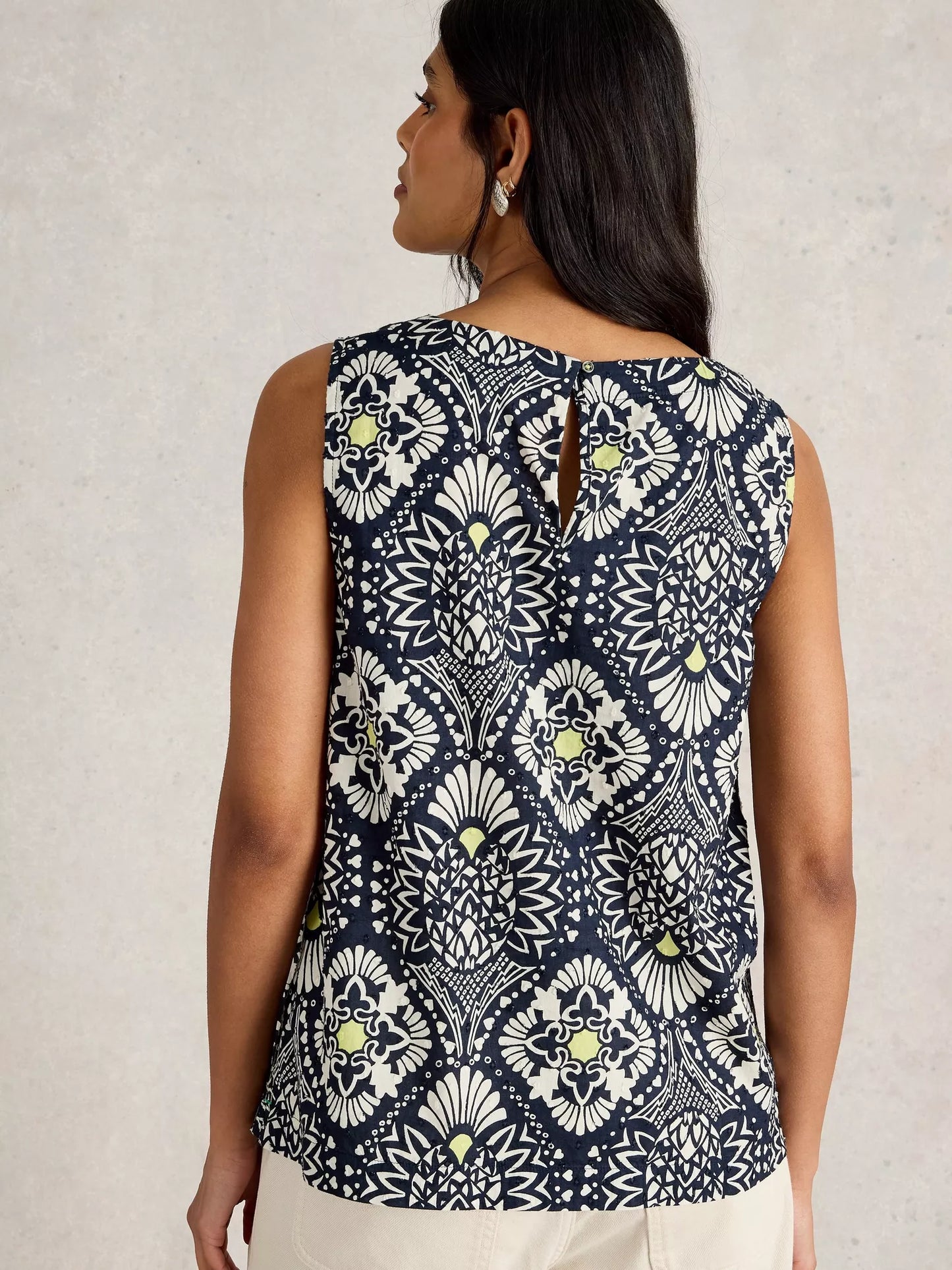 Paradise Cotton Vest, sporting a tropical print with a playful pop of chartreuse along with classic navy and white