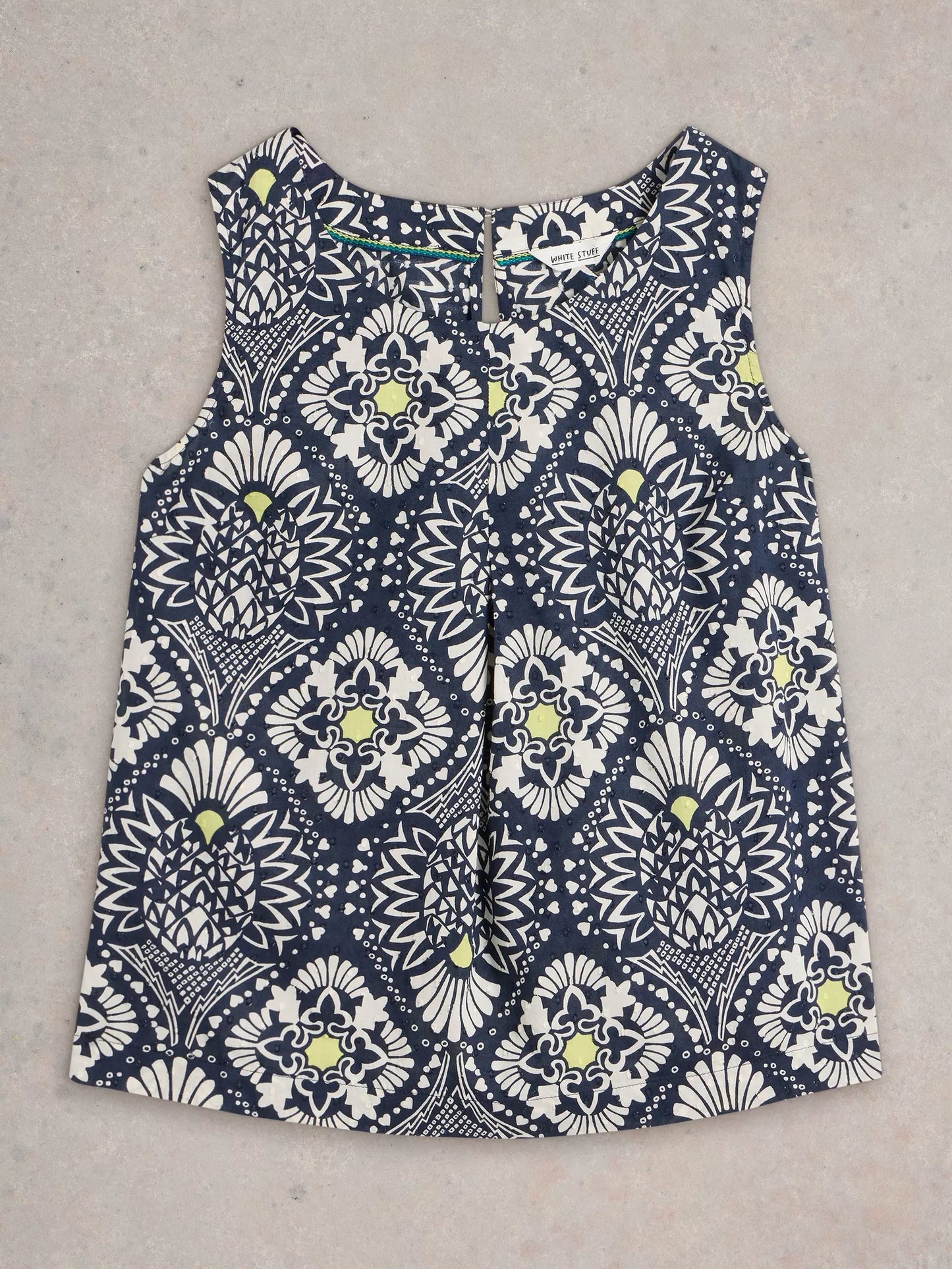 Paradise Cotton Vest, sporting a tropical print with a playful pop of chartreuse along with classic navy and white