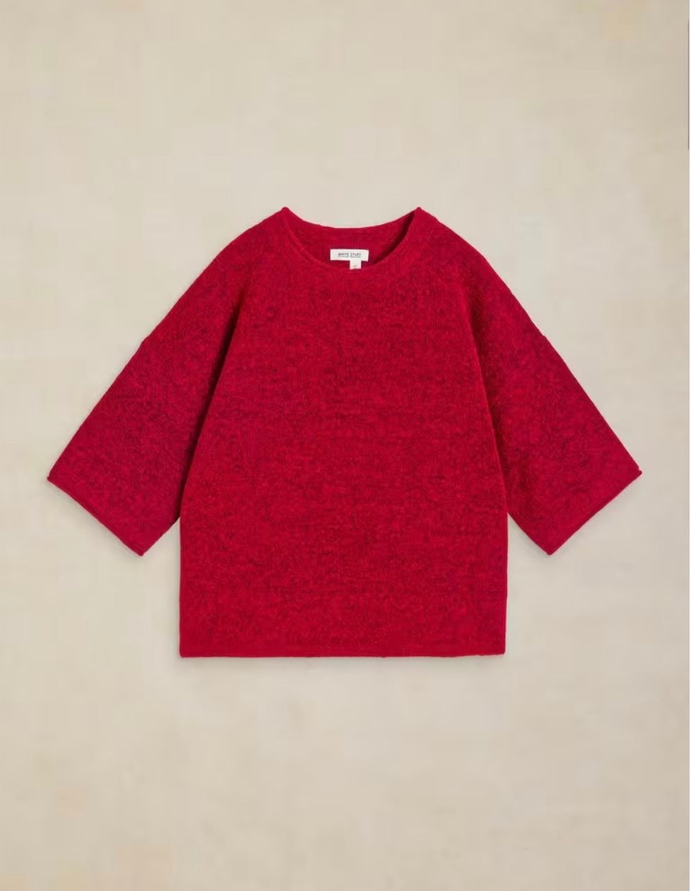 Woman wearing the red Kate knitted tee by White Stuff