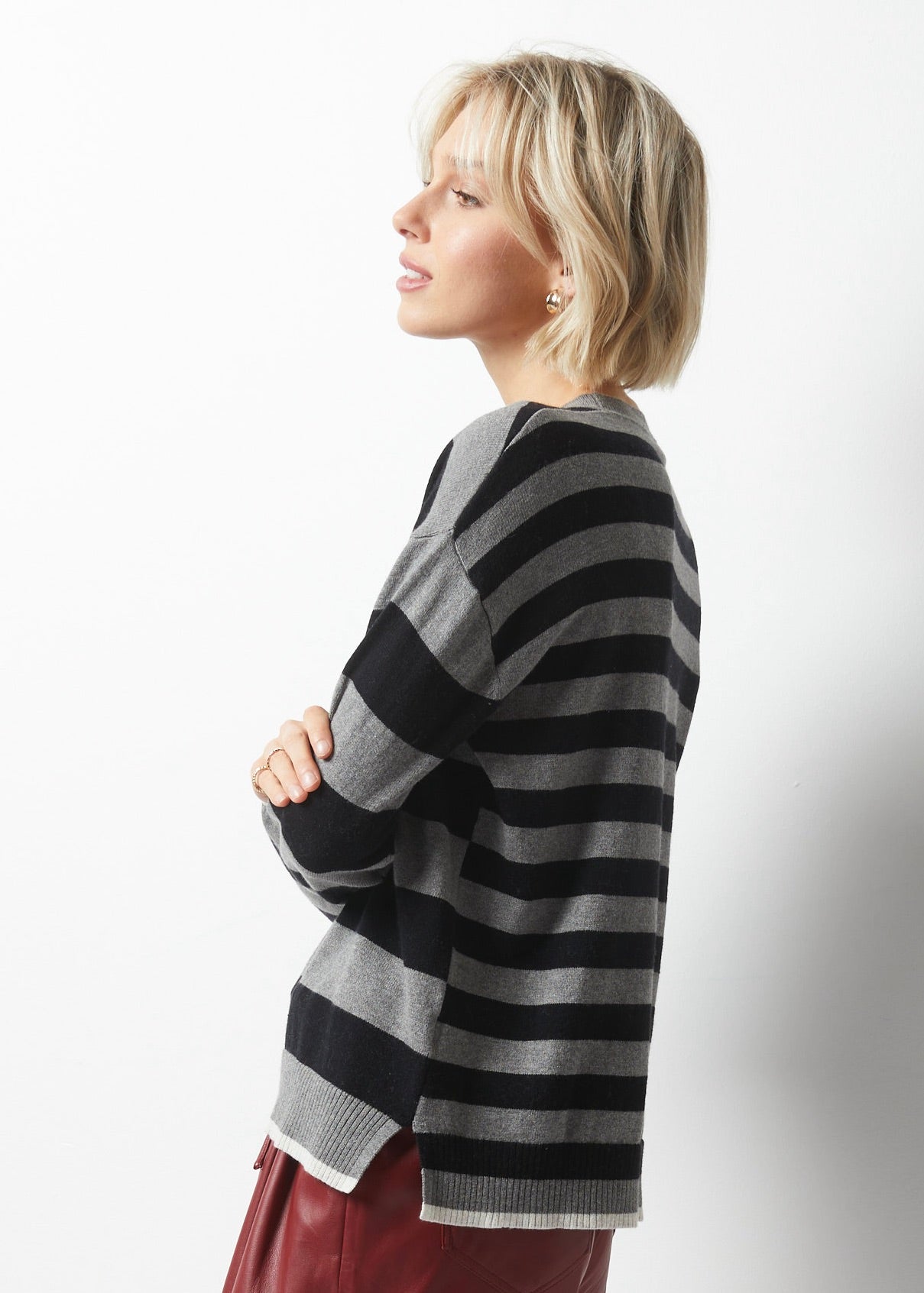 Take your wardrobe to the next level with Essential Striped Crew from Zaket & Plover in Charcoal. This simple sweater is anything but ordinary, featuring stripes of different sizes in black and charcoal on the front and back, along with contrasting accents at the bottom and sleeves in warm white. Made with a luxurious cashmere blend. lemon cyprus boutique