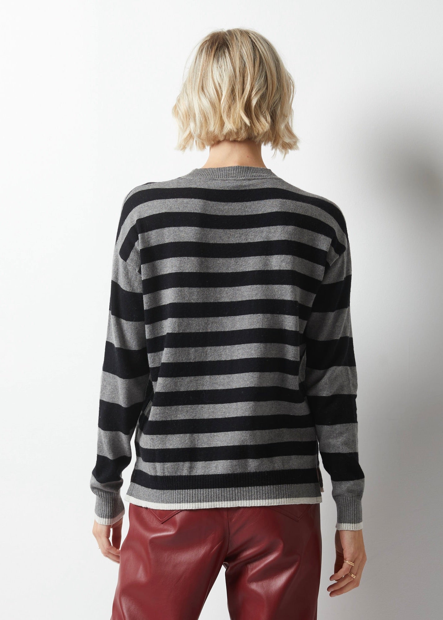 Take your wardrobe to the next level with Essential Striped Crew from Zaket & Plover in Charcoal. This simple sweater is anything but ordinary, featuring stripes of different sizes in black and charcoal on the front and back, along with contrasting accents at the bottom and sleeves in warm white. Made with a luxurious cashmere blend. lemon cyprus boutique