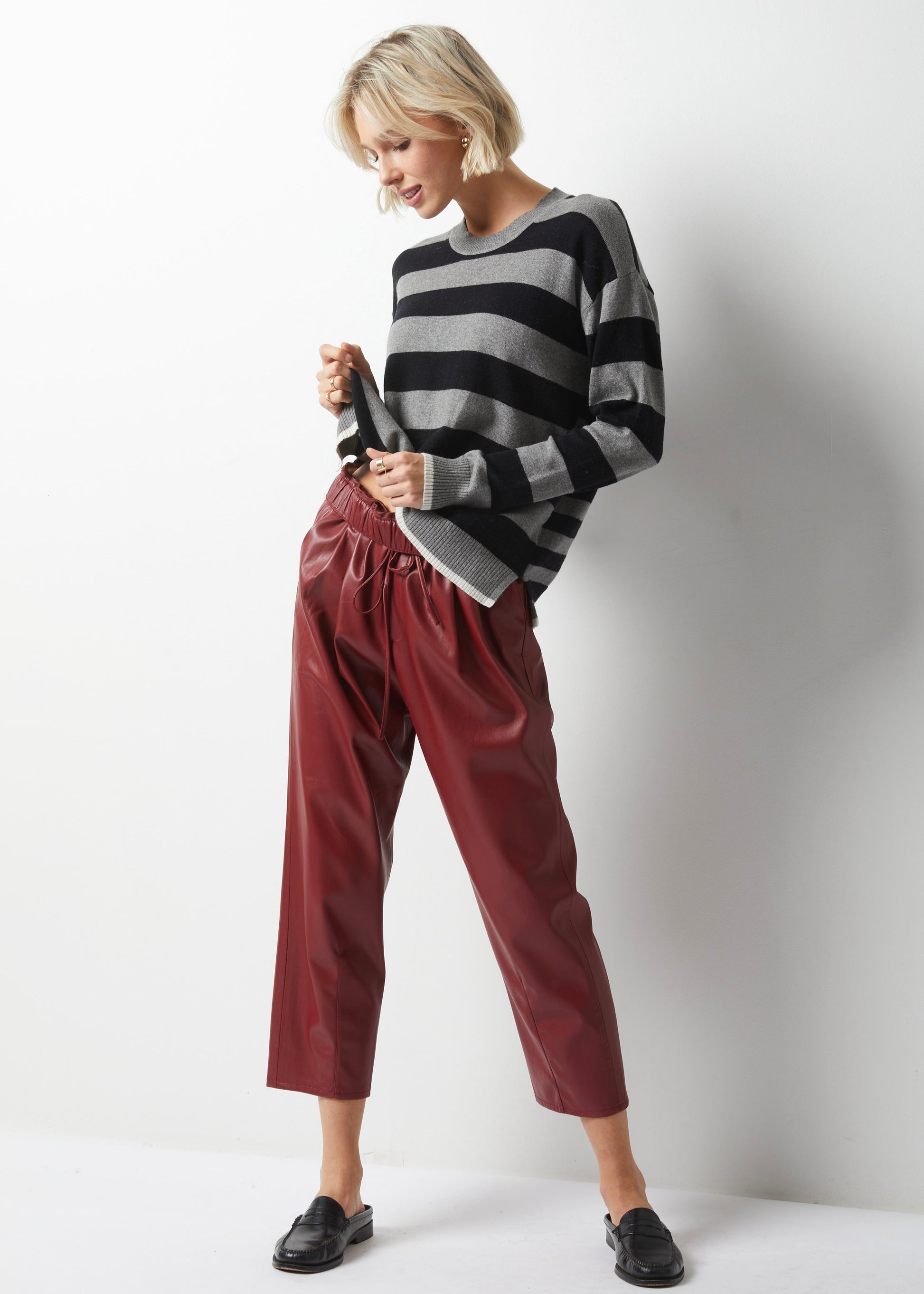 Take your wardrobe to the next level with Essential Striped Crew from Zaket & Plover in Charcoal. This simple sweater is anything but ordinary, featuring stripes of different sizes in black and charcoal on the front and back, along with contrasting accents at the bottom and sleeves in warm white. Made with a luxurious cashmere blend. lemon cyprus boutique