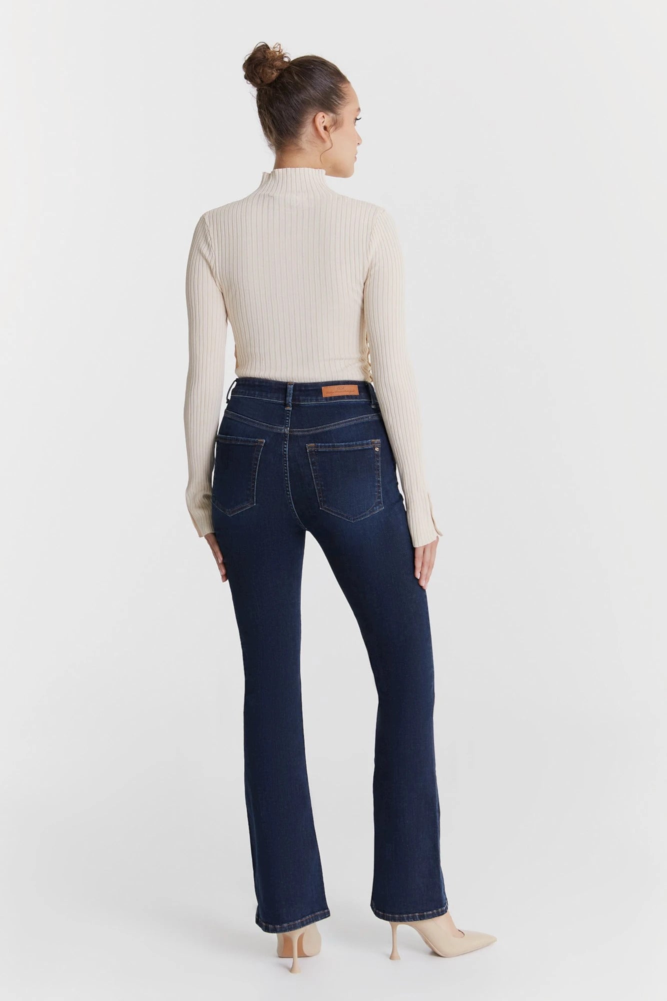 Dark denim, Shapely, 5-pocket, flared Matilda jeans by CoJ denim ~ designed to hug curves for a slenderizing and confident fit that pairs perfectly with any ensemble! Super-stretchy denim. lemon cyprus boutique