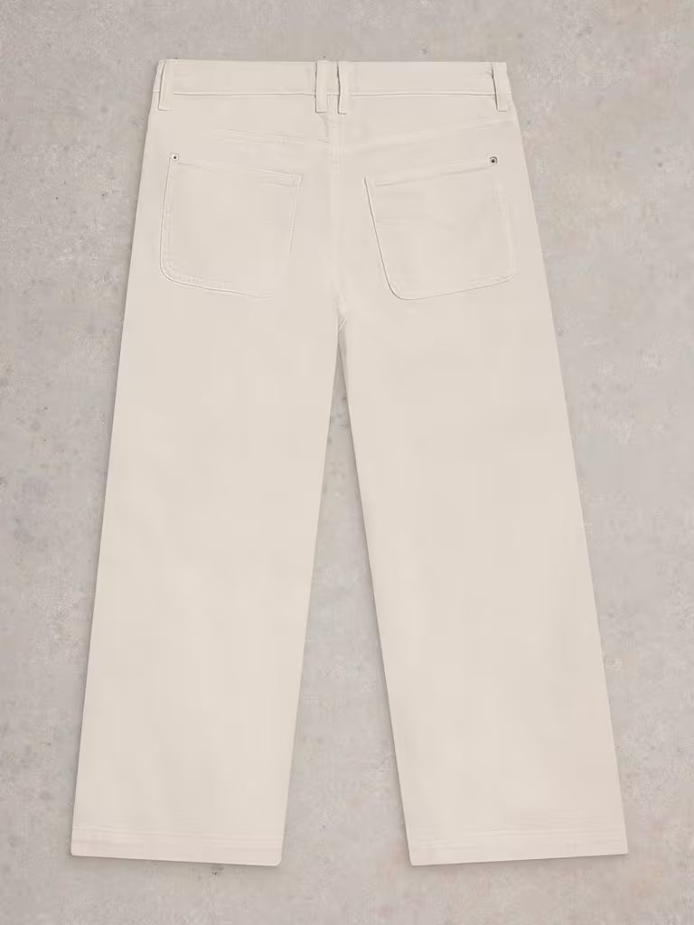Beige pants on a gray background