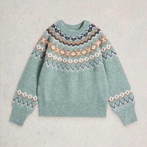Light blue sweater with patterned design on a light gray background