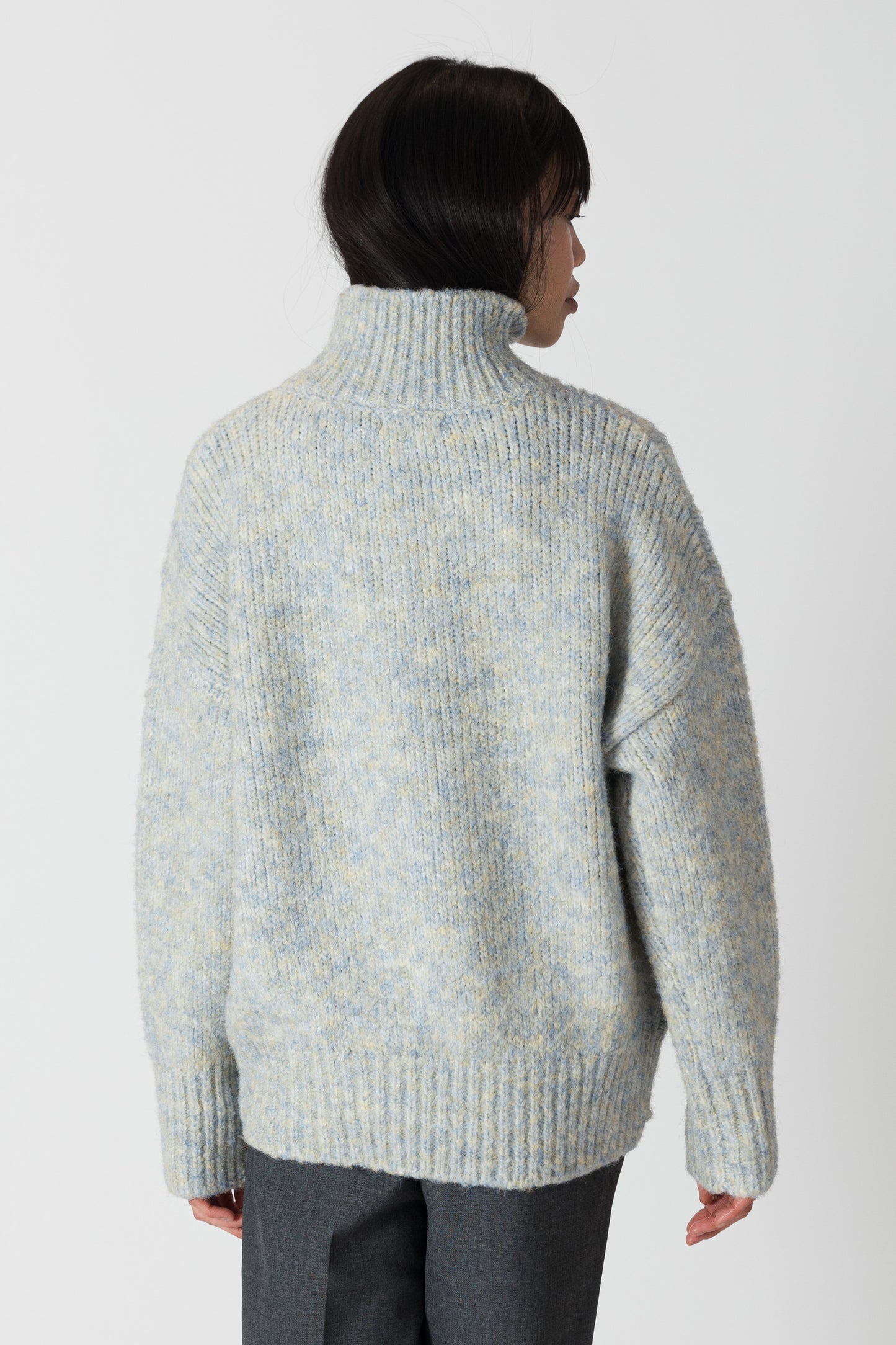 Our Aggie sweater, in a stunning blue yellow marl, brings both style and warmth to your wardrobe. With its flattering fit and luxurious fabric, this mock neck sweater from Lyla &amp; Luxe is perfect for any occasion. lemon cyprus boutique