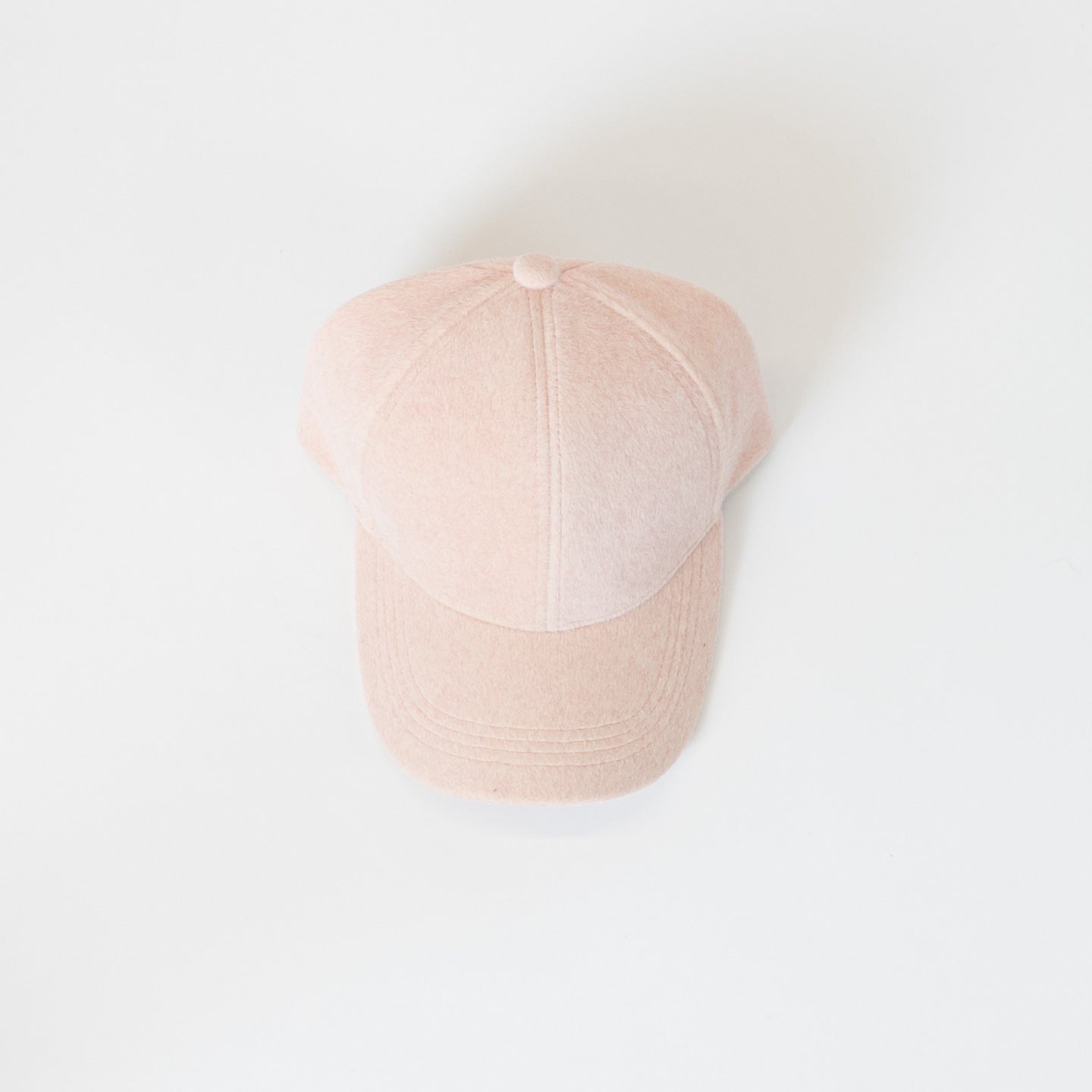 Keep your head warm and stylish with this oatmeal coloured felt baseball cap by Lyla &amp; Luxe. lemon cyprus boutique