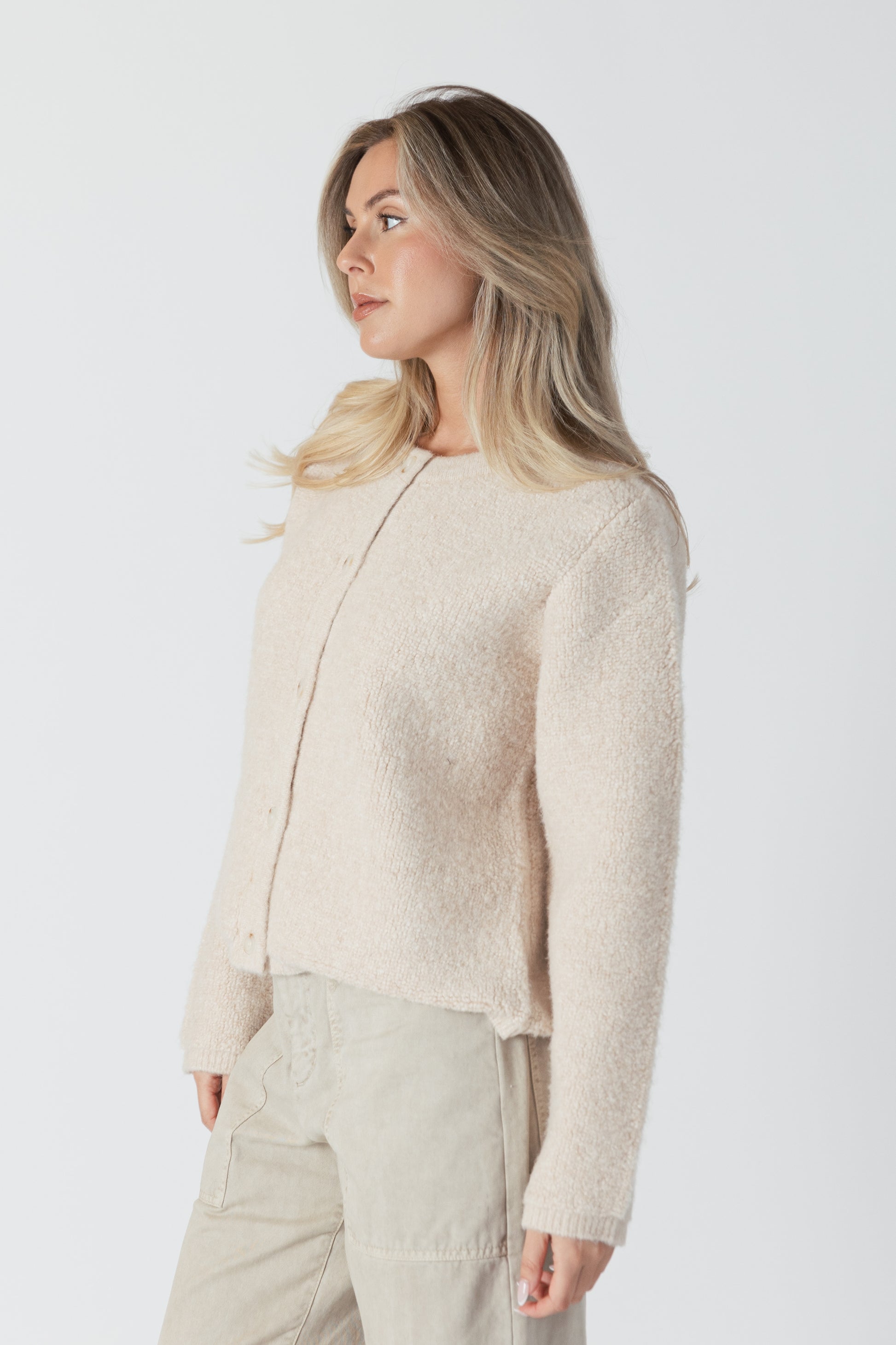 The Ellie Luxe Sherpa Cardi from Lyla &amp; Luxe is a beautiful vanilla-coloured button-up cardigan that exudes coziness. Perfect for wearing as a fall jacket or a comfy layering piece, this cardi will have you feeling like you're wrapped in a warm, fluffy vanilla cloud. lemon cyprus boutique