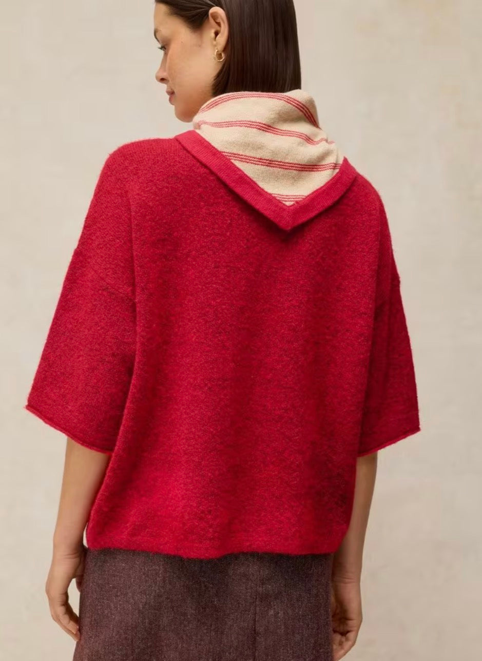 Woman wearing the red Kate knitted tee by White Stuff