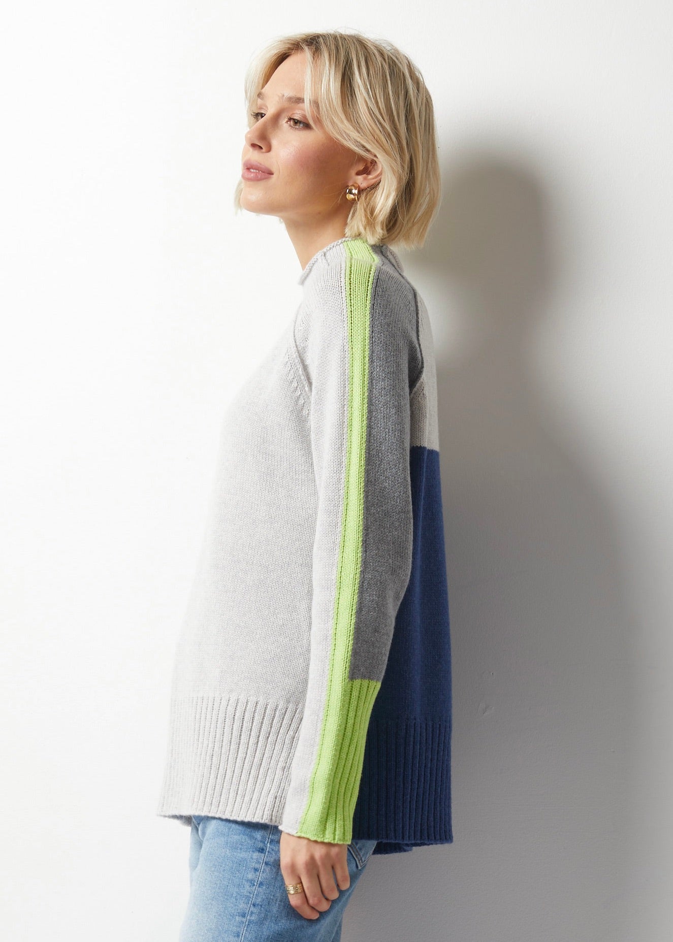 Embrace style and comfort in Zaket &amp; Plover's Intarsia Funnel Neck Sweater. The eye-catching colour block pattern with a pop of neon yellow will make a statement, while the cozy material keeps you warm and snug (and stylish) all day long! lemon cyprus boutique