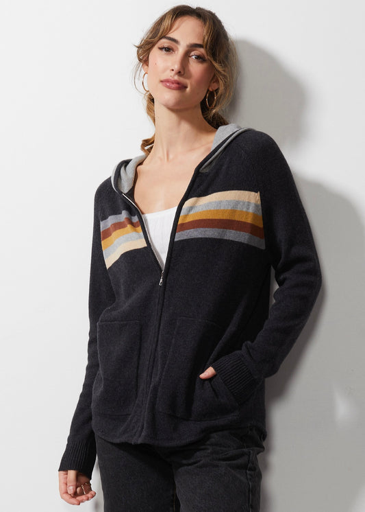 The Zaket & Plover Retro Stripe Hoodie in Denim boasts a vintage feel and ultimate comfort that is sure to become a staple in your everyday wear. With long sleeves, striped print, full zipper, and 2 side pockets, this hoodie is perfect for fall and its loose fit allows for easy layering. Complete with ribbed hem and cuffs for added style, this is a must-have for any fashion-forward individual. lemon cyprus boutique