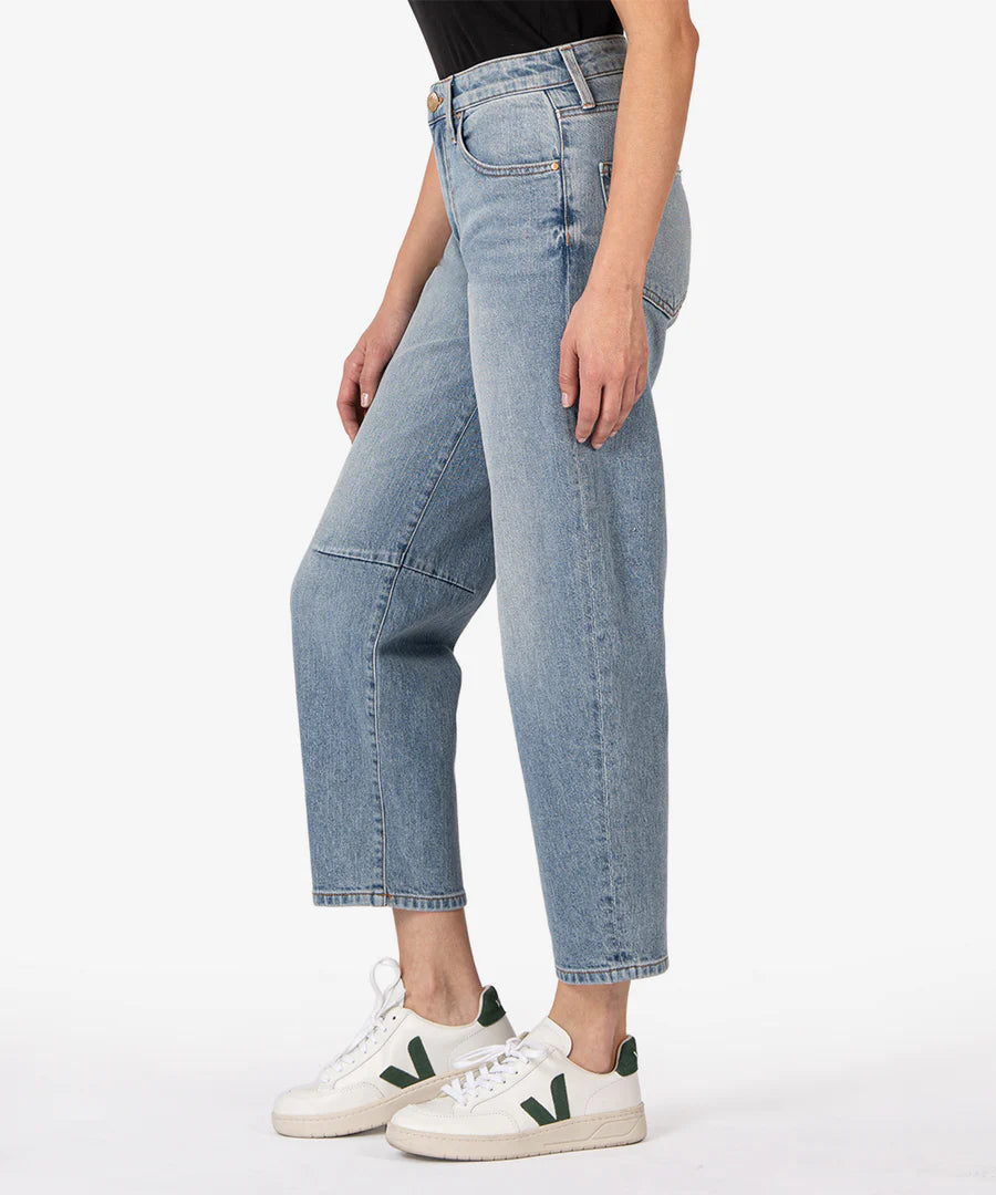 The Kut from the Kloth Ashley High Rise Barrel Straight Leg Denim is constructed with a hint of stretch vintage-inspired denim, providing a modern and effortlessly cool silhouette. This piece boasts a high rise fit, completing the perfect combination of comfort and style. medium light blue denim wash. lemon cyprus boutique