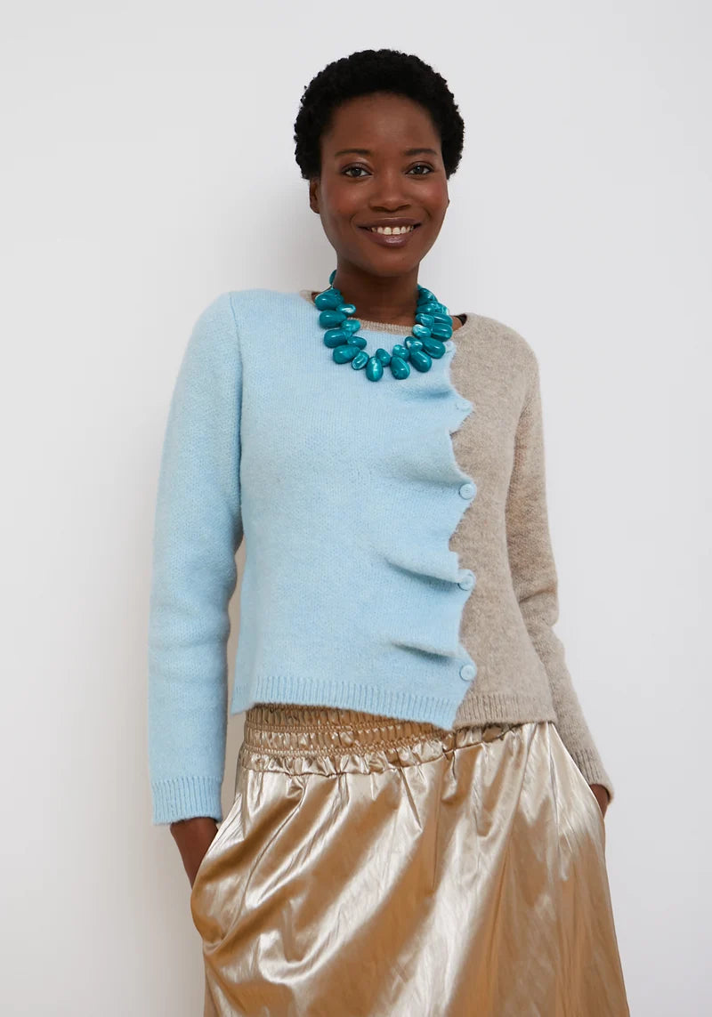Blue Biscuit Cardigan by Dr Bloom, sky blue and beige colour-block knit cardigan with ruffle button front and orange neckline trim