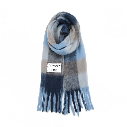 Plaid scarf in blue tones with 'Cowboy Life' label on a white background