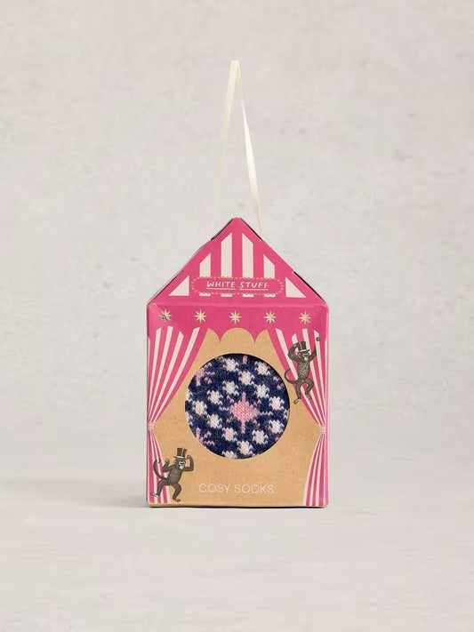 Packaged sock with floral design on a pink and white striped background