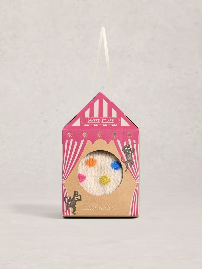 Packaged socks with colorful design on a light gray background