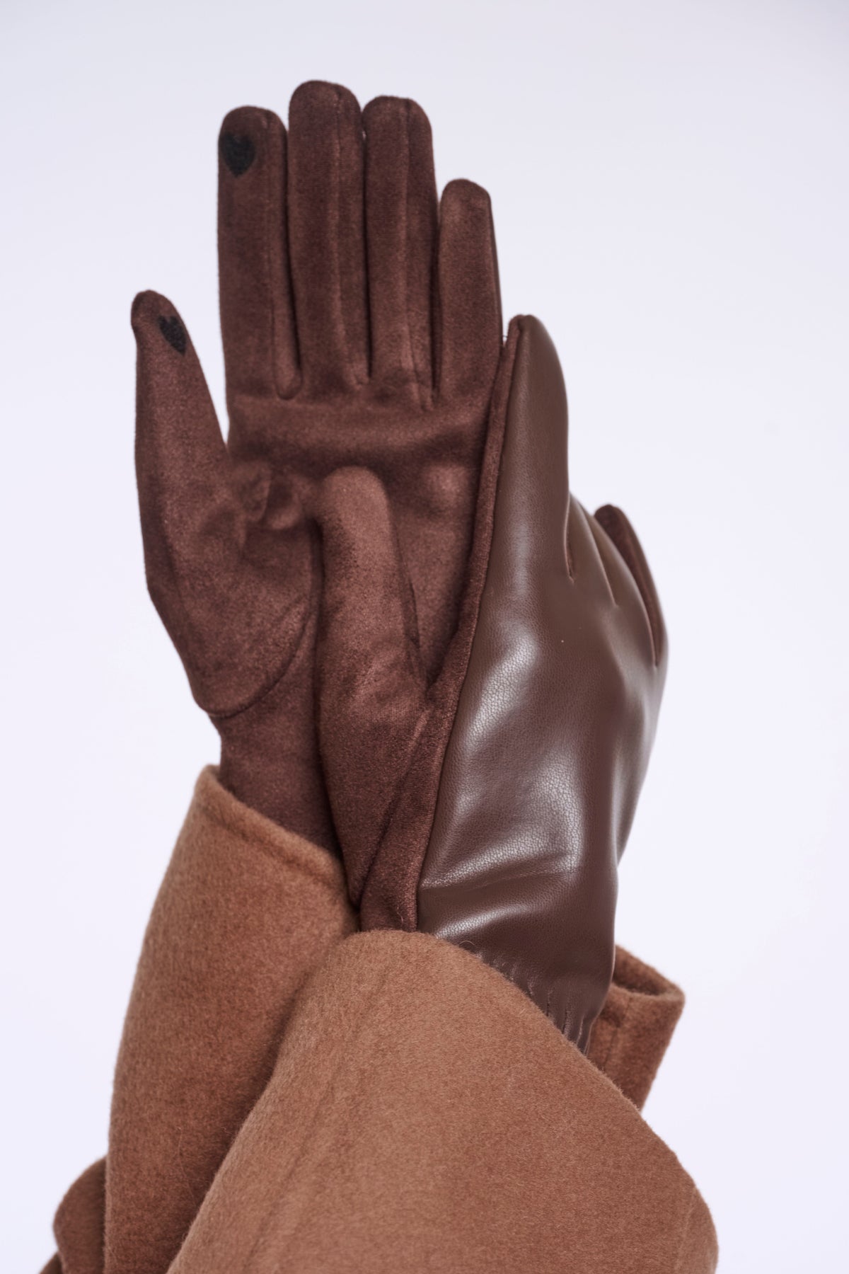 Rino & Pelle Fidelia faux leather gloves in Coffee Roast brown with suede-feel palm and heart fingertip detail, worn with a camel coat