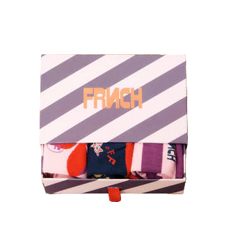Striped pouch with 'FRNCK' branding on a textured beige surface