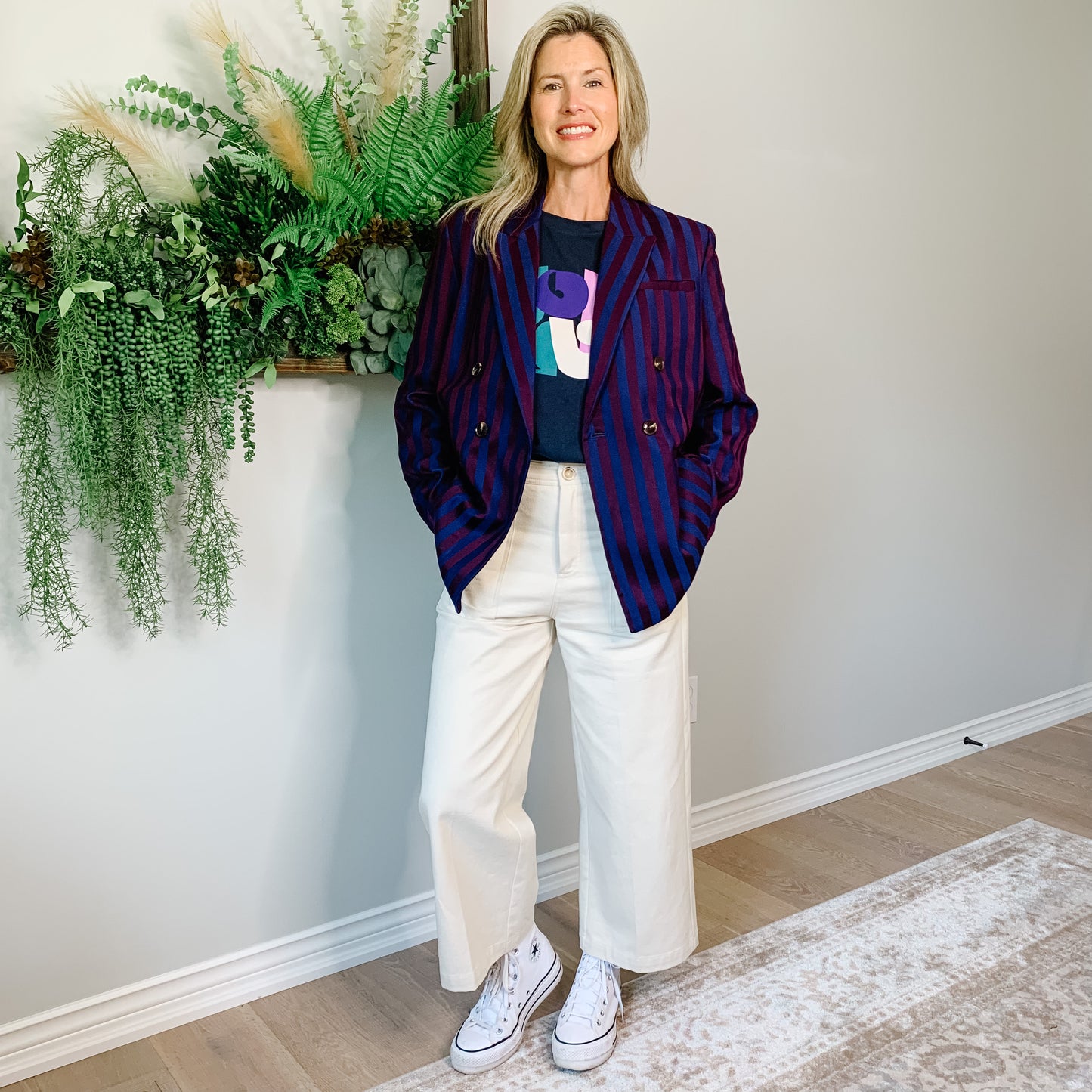 This double-breasted navy and burgundy striped blazer is oversized and totally versatile—so you can rock it with jeans, trousers, or even a skirt!