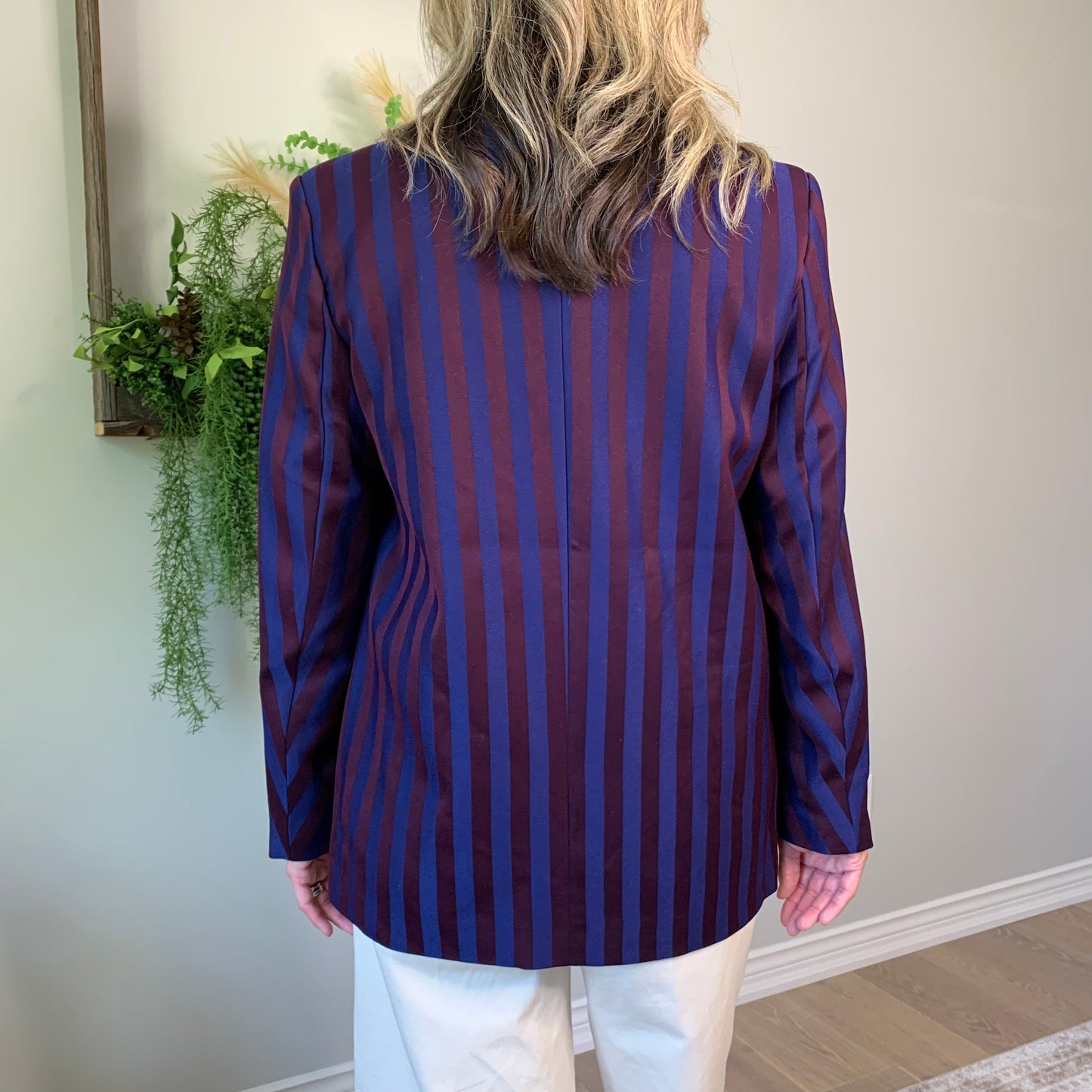 This double-breasted navy and burgundy striped blazer is oversized and totally versatile—so you can rock it with jeans, trousers, or even a skirt!