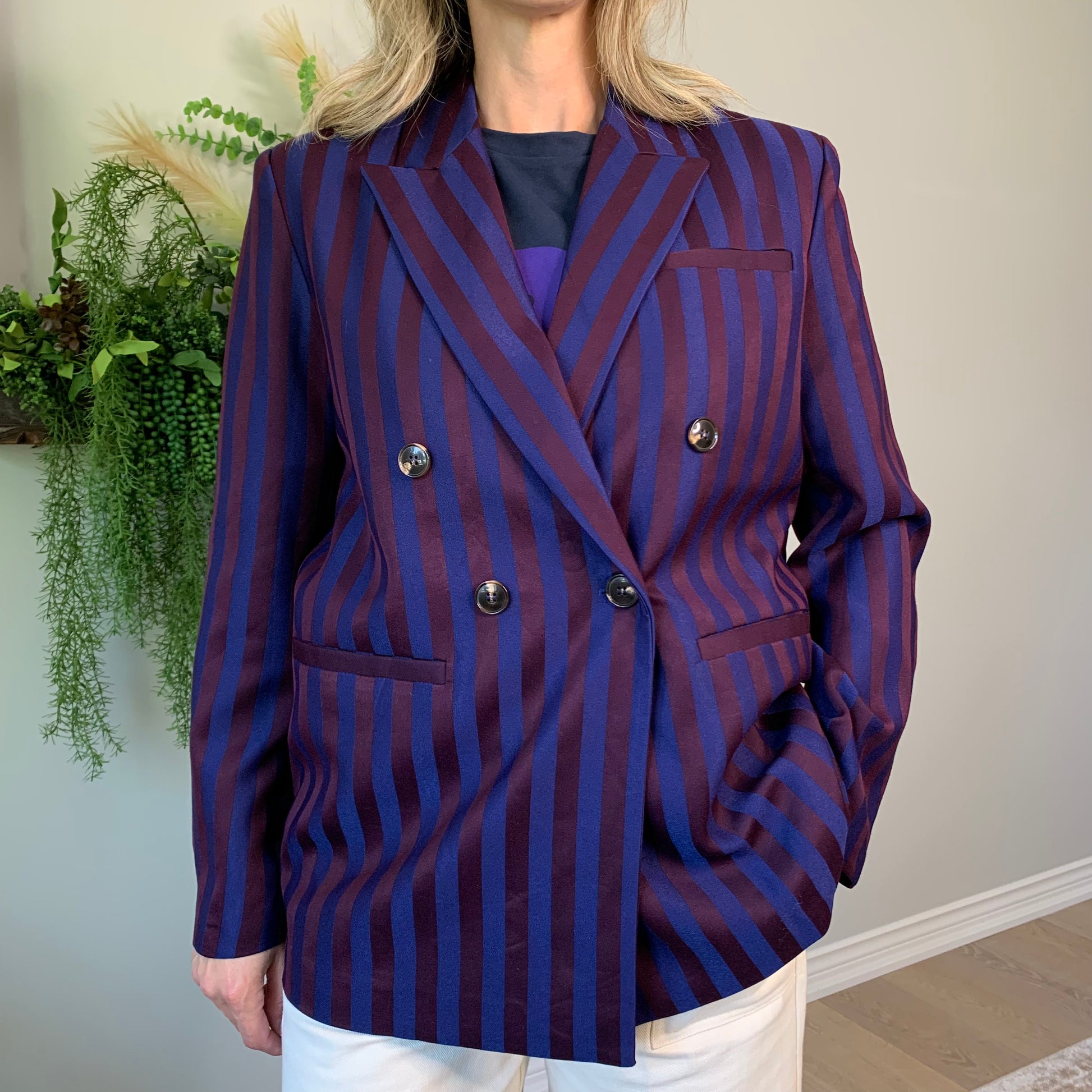 This double-breasted navy and burgundy striped blazer is oversized and totally versatile—so you can rock it with jeans, trousers, or even a skirt!