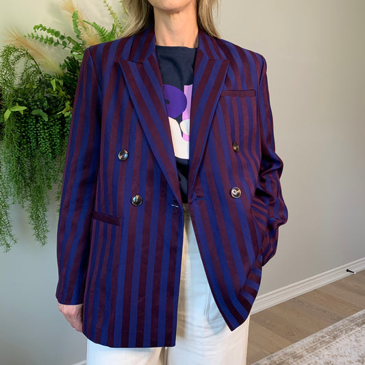 This double-breasted navy and burgundy striped blazer is oversized and totally versatile—so you can rock it with jeans, trousers, or even a skirt!