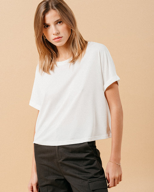 Introducing the MAMA round neck tee by Grace &amp; Mila, a must-have addition to your wardrobe essentials. In a warm white ecru colour, this short sleeve top brings ultimate comfort to your everyday wear with its wide and fluid silhouette. Embrace its relaxed fit, perfect for mixing and matching with a variety of pieces for a laid-back, urban-inspired ensemble.