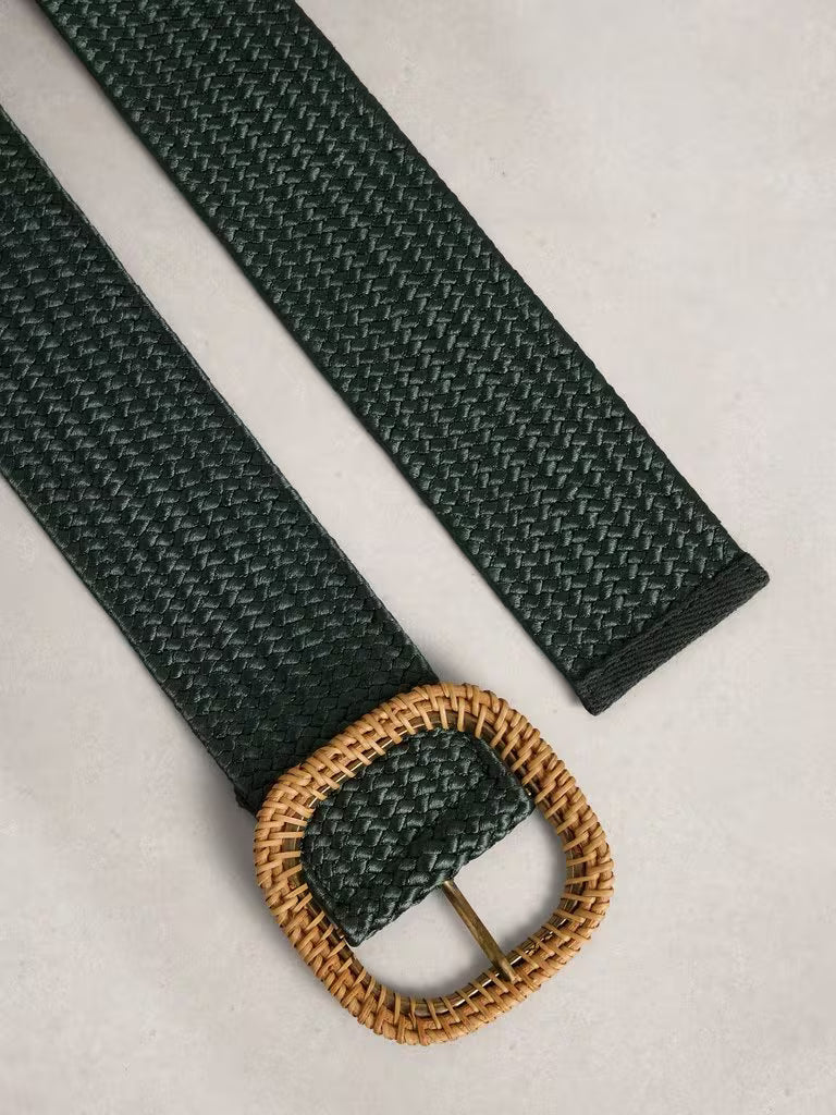 Green woven belt with a brown buckle on a light gray background