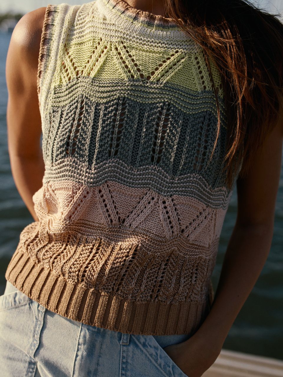 Crochet is synonymous with summer, at least for us. So, if you need to feel a little summery—or if you're planning your next warm-weather getaway—this vest is for you. Its straight fit, different colors and ribbed hem give it a retro feel we love.