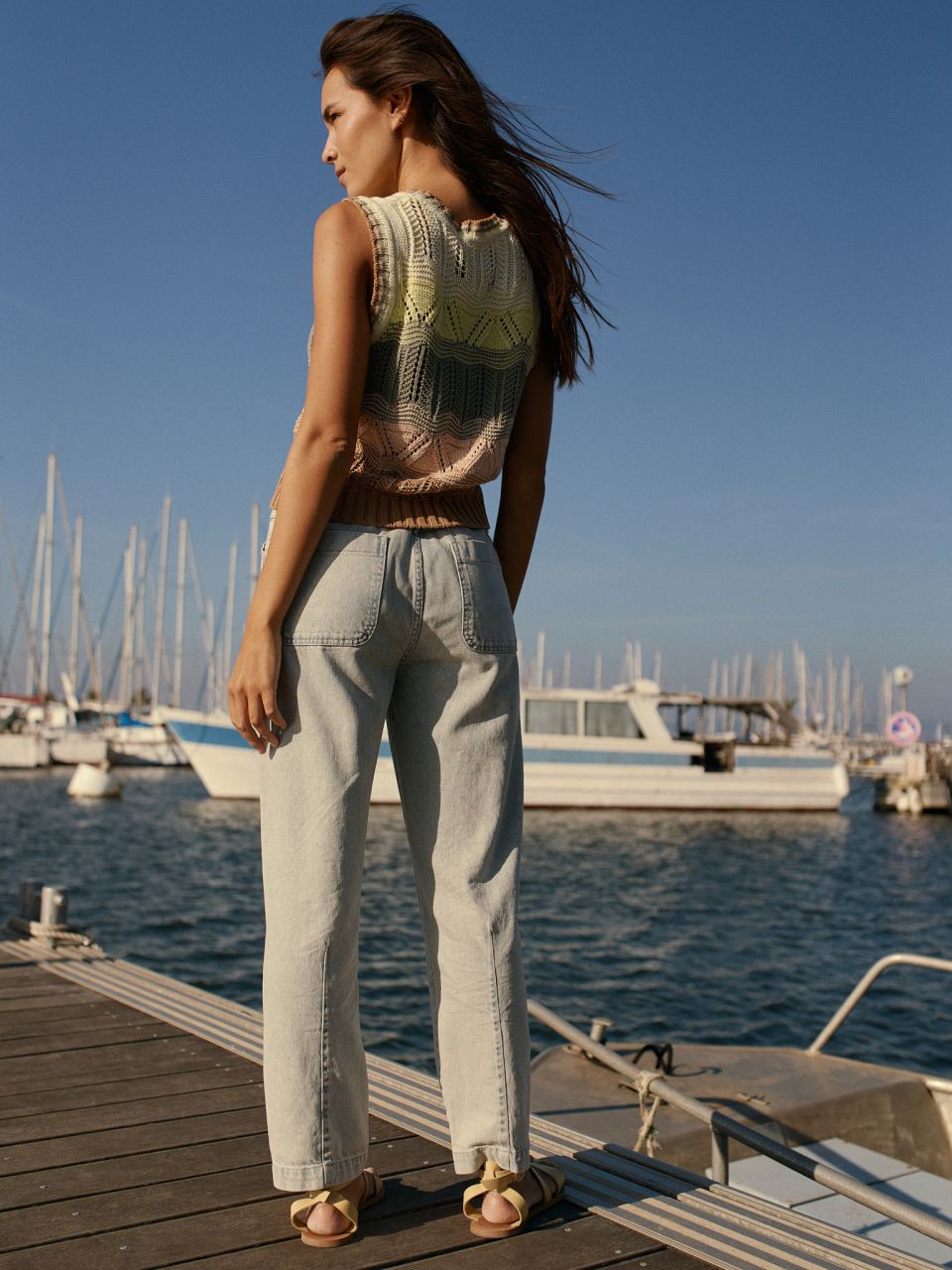 Crochet is synonymous with summer, at least for us. So, if you need to feel a little summery—or if you're planning your next warm-weather getaway—this vest is for you. Its straight fit, different colors and ribbed hem give it a retro feel we love.