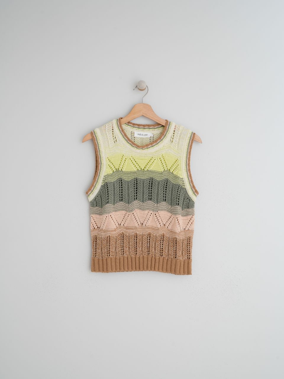 Crochet is synonymous with summer, at least for us. So, if you need to feel a little summery—or if you're planning your next warm-weather getaway—this vest is for you. Its straight fit, different colors and ribbed hem give it a retro feel we love.