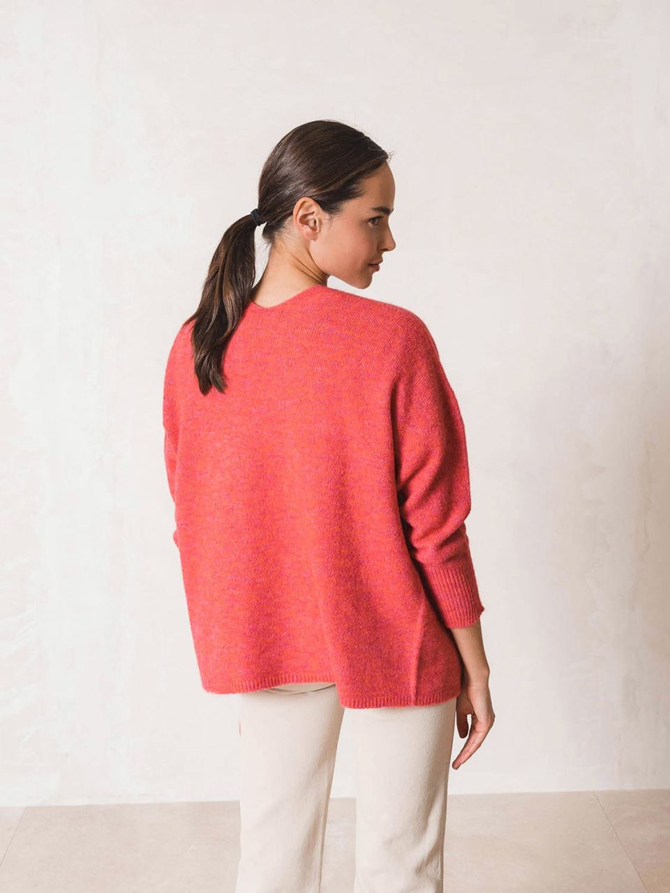 indi and cold llong knitted cardigan With a cozy neckline, lengthy draped-shoulder sleeves, and an oh-so-relaxed fit, it's a must-have for chillier temps. Plus, that pink hue is lovely. lemon cyprus boutique