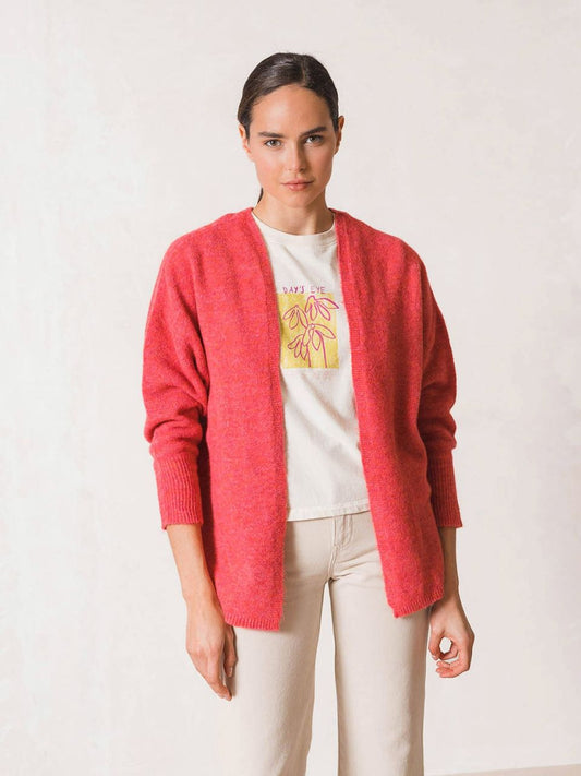 indi and cold llong knitted cardigan With a cozy neckline, lengthy draped-shoulder sleeves, and an oh-so-relaxed fit, it's a must-have for chillier temps. Plus, that pink hue is lovely. lemon cyprus boutique