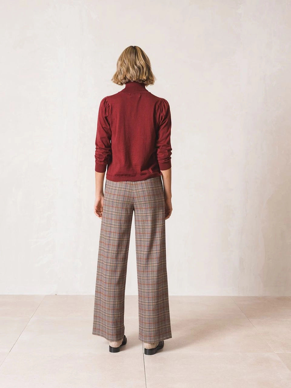 these indi & cold tartan trousers in burgundy tomes with a touch of blue are about to become your new go-to! The elastic waistband ensures a comfy fit, while the French front pockets and a flowy maxi length give it that cool, everyday look.  lemon cyprus boutique
