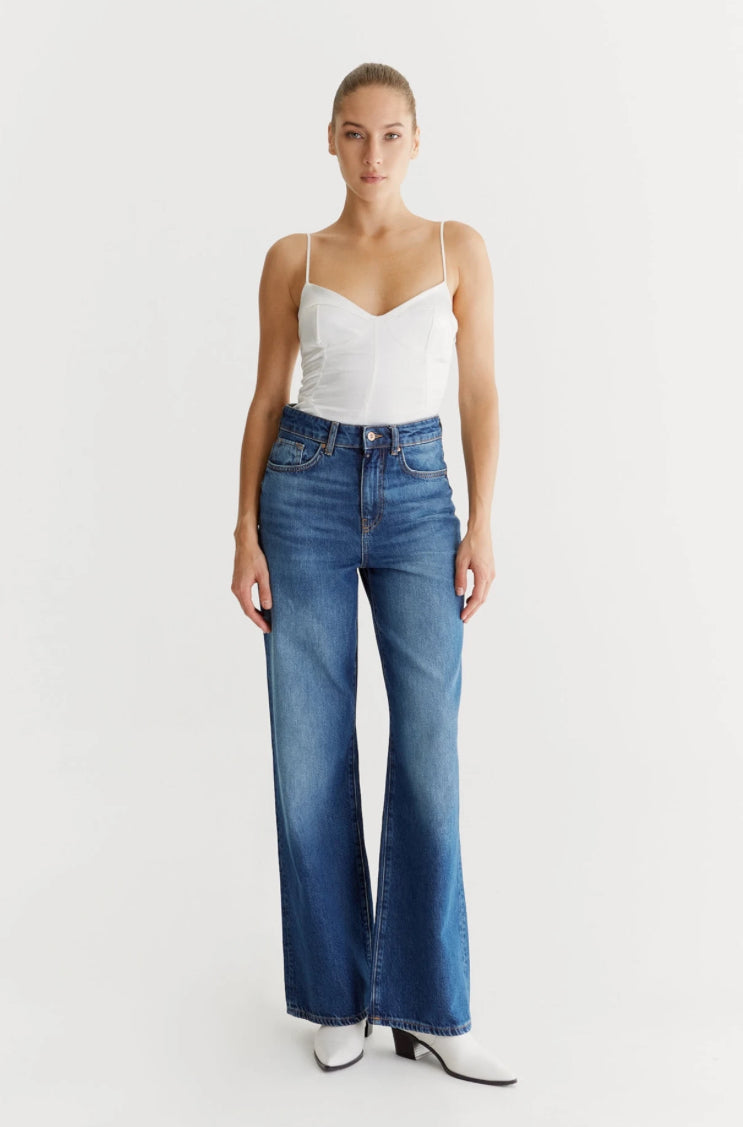 For a laid-back yet stylish vibe, rock Maria Jean from Cup of Joe Denim. These ultra high waist wide leg jeans are incredibly comfortable, perfect for pairing with a tee or sweater. Want to dress it up? Just throw on a blazer and heels for a classy and chic look.