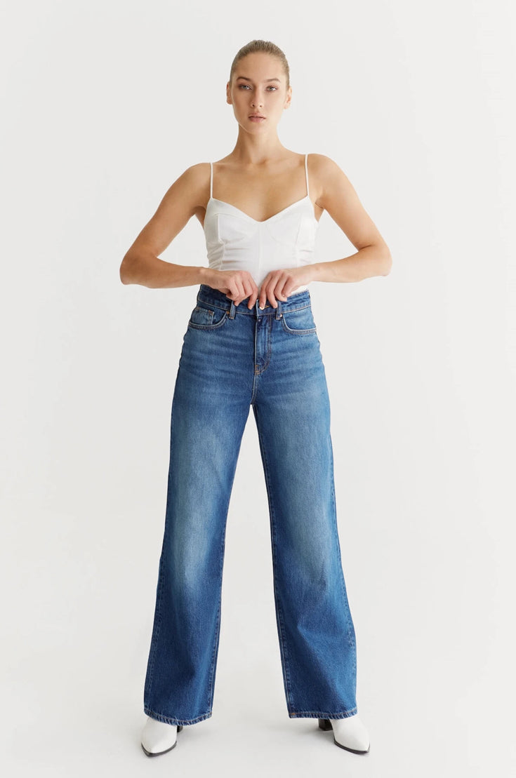 For a laid-back yet stylish vibe, rock Maria Jean from Cup of Joe Denim. These ultra high waist wide leg jeans are incredibly comfortable, perfect for pairing with a tee or sweater. Want to dress it up? Just throw on a blazer and heels for a classy and chic look.