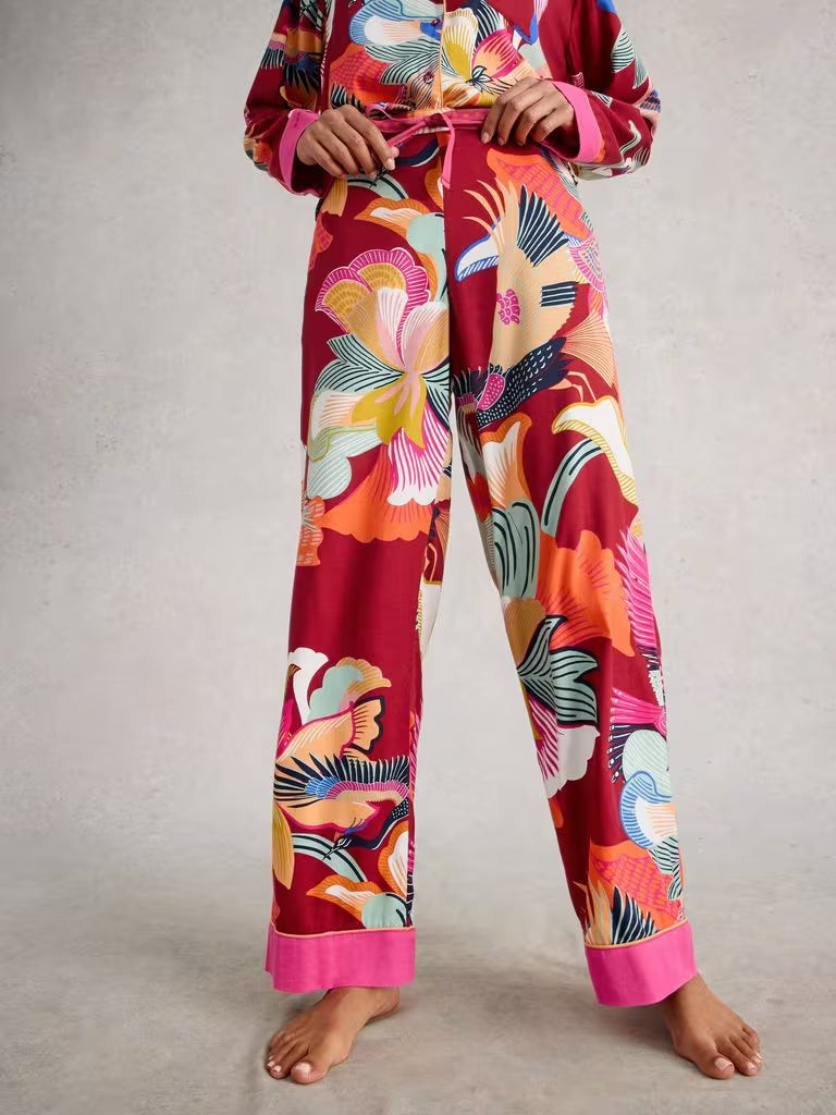 Colorful floral pajama set on a neutral background