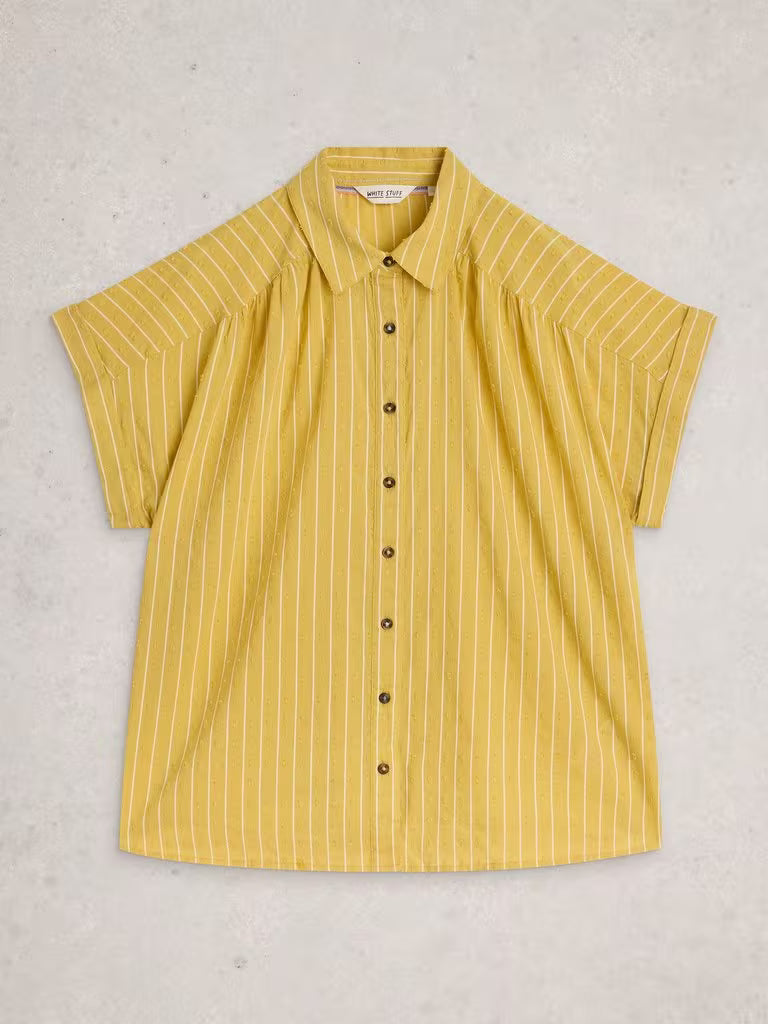Yellow striped shirt on a light gray background