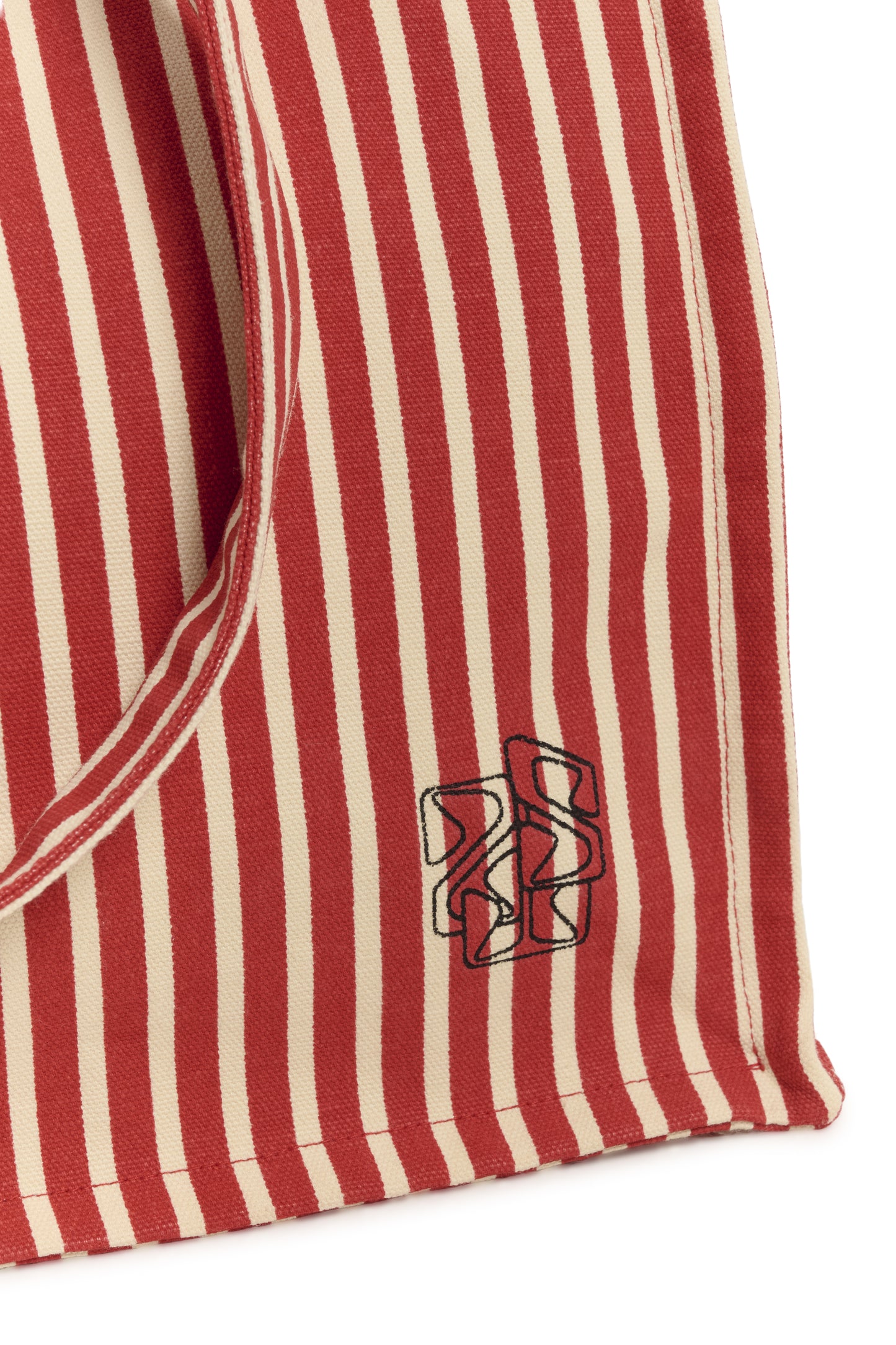 Red and white striped fabric with a logo on a white background