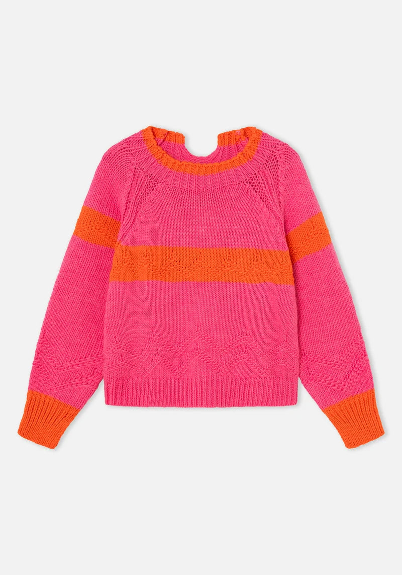 Woman wearing pink and orange Carmelo Pink Candy Sweater by Dr Bloom, front view