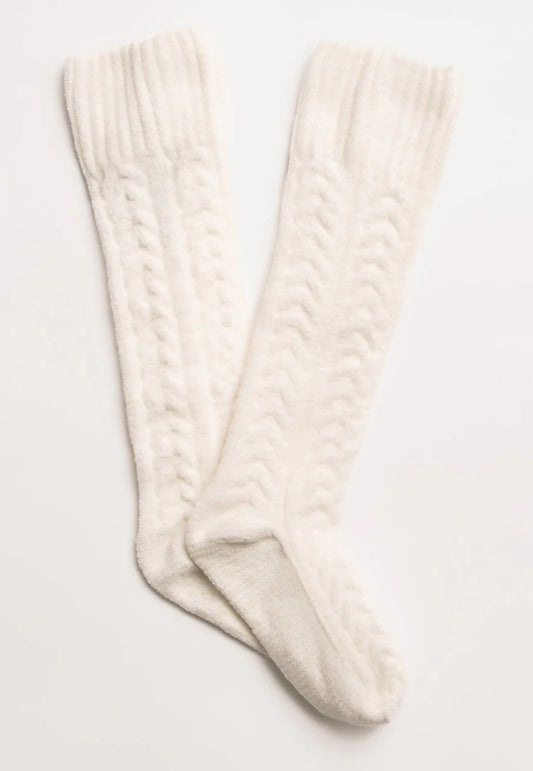 We love us some cable knit sweater knee socks - don't you? All kinds of soft & statement-making, these tall Cable Crew Lounge Socks by PJ Salvage are fun to wear in a textured cable knit.  Available in black and ivory. lemon cyprus boutique