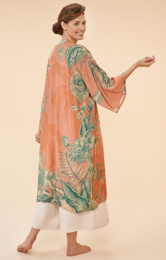 Explore the captivating beauty of the Floral Jungle Kimono Gown by Powder UK. Featuring a striking combination of leopard prints and&nbsp;beautiful florals, this versatile piece is a must-have for every wardrobe. Whether you're lounging at home or attending a fancy dinner, this kimono gown will elevate your style effortlessly.