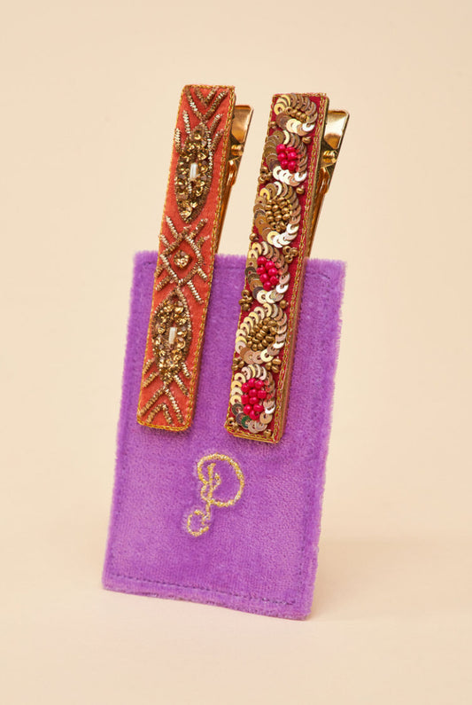 This is where unique and luxurious design meets art deco dreaming. These narrow-jewelled hair bars in rose by POwder UK are the perfect gift for any fashionista or vintage enthusiast in your life. Elevate styling from day to night effortlessly with these gorgeous handmade hair bars. Comes on a velvet card for the most thoughtful gift for someone or treat for yourself