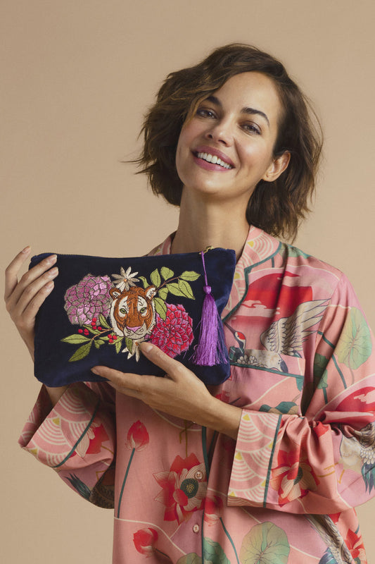 Look fierce day-to-night! This Floral Tiger Face design will have you feeling wild and dreaming of adventures. Powder Uk's Velvet Zip Pouches make a super gift and are hugely versatile. Carry down to evening drinks or keep in your hand luggage as an organiser. 