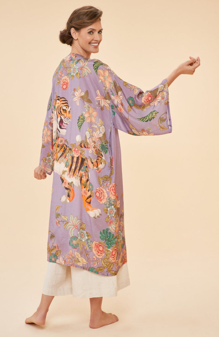 Crafted with inspiration from traditional tapestries, the Prancing Tiger Kimono Gown from Powder UK is a must-have for those who appreciate intricate designs and everyday indulgences. Blending soft colours and delicate flower motifs, this gown is a sophisticated addition to any wardrobe. Wear it over jeans and a top for a stylish cover-up, or layer it over a dress for an elegant touch.