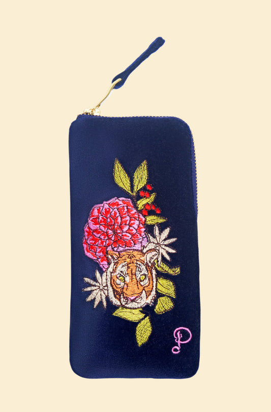 This Floral Tiger Face Sunglasses Pouch by Powder UK will have your sunglasses feeling more luxurious than ever! Puuur-fect for keeping them safe and stylish. 