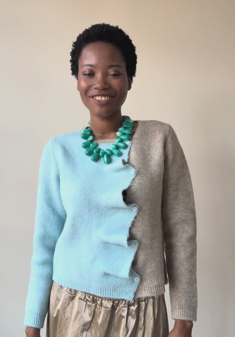 Blue Biscuit Cardigan by Dr Bloom, sky blue and beige colour-block knit cardigan with ruffle button front and orange neckline trim